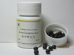 E-Fong Du Huo Ji Sheng Wan bottle close-up with clear label and capsules.