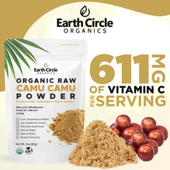 Earth Circle Organics Camu Camu powder scoop beside a glass of prepared juice for easy use.