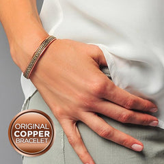 Earth Therapy adjustable wrist strap demonstrates 6.5–8.75 inch fit.