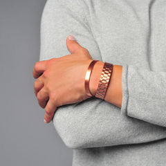 Earth Therapy copper magnetic cuff adjustment close-up for comfortable fit.