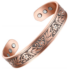 Earth Therapy cuff on the wrist, floral crystal design for daily wear.