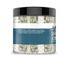 Earthborn Elements Apple Cider Vinegar capsules close-up, pure and undiluted.