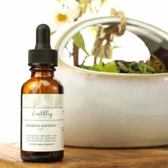 Earthley Wellness amber bottle on counter ready for precise daily dosing