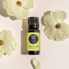 Edens Garden Breathe Easier bottle being poured for diffuser use.