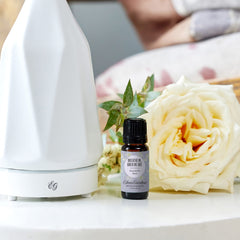 Edens Garden diffuser setup releasing a soothing, uplifting aroma.