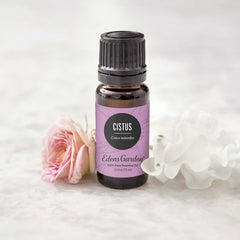 Edens Garden Cistus oil bottle closeup highlighting earthy fragrance notes.