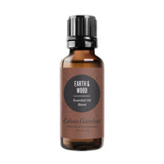 Edens Garden Earth & Wood bottle highlights cedarwood notes for grounding ambiance.