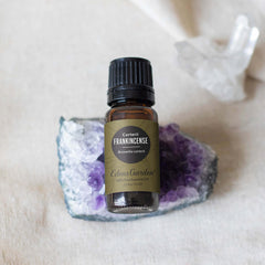Diffuser with Edens Garden Frankincense Carterii creating grounding atmosphere.