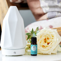 Edens Garden Germ Ease label closeup, showcasing pure essential oil ingredients and premium quality