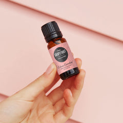 Edens Garden Grapefruit Pink essential oil in diffuser setup for mood uplift.