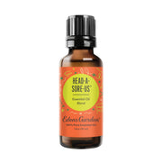 Edens Garden Head-A-Sore-Us bottle front displays calming essential oil blend.