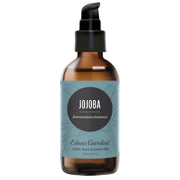 Edens Garden Jojoba Oil bottle on a clean surface for daily hydration.