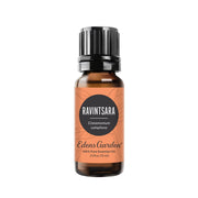 Edens Garden Ravintsara oil bottle closeup, showcasing a fresh, invigorating aroma.