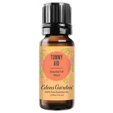 Edens Garden Tummy Aid diffuser bottle in calming aromatherapy setup.