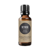 Edens Garden Vetiver oil bottle closeup for grounding scent in daily routines.