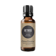 Edens Garden Vetiver oil bottle closeup for grounding scent in daily routines.