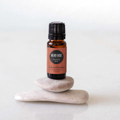 Head Ease bottle label close-up showing premium essential oils for diffusing