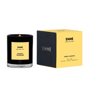 EMME NYC scented candle in a black glass jar with a strong fragrance.