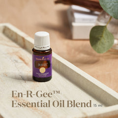 En-R-Gee bottle pour illustrating easy on-the-go energy through aromatherapy