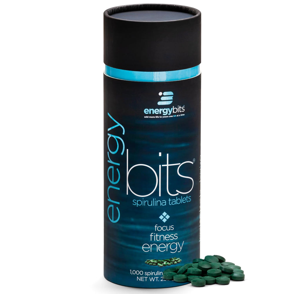 ENERGYBITS spirulina tablets on packaging close-up for easy on-the-go energy