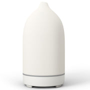 ENILYM essential oil diffuser ceramic white closeup showing handcrafted craftsmanship and compact form