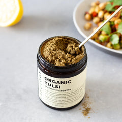Erbology Tulsi jar back label reveals origin and sustainability
