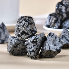 Erliway Snowflake Obsidian close up shows sparkles and texture for energy balance