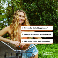 Essential Elements Turmeric Curcumin capsules close-up, easy-to-swallow daily supplement.