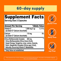 Ester-C capsules pouring from bottle highlight 24-hour immune support.