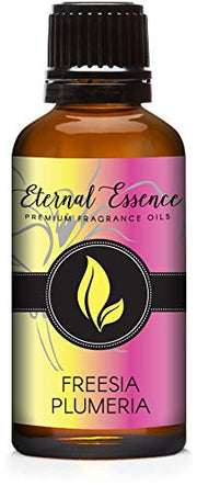 Eternal Essence Oils Freesia Plumeria 30ml bottle with pour cap for precise dispensing.