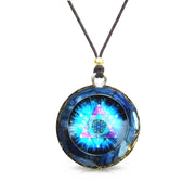 EternalOrgone kyanite pendant closeup with natural crystal and gold foil detailing for calm focus