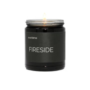 Everlume Fireside candle in a black glass jar creates cozy, fireside ambiance.