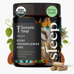Fantastic Fungi Reishi capsules bottle on nightstand for easy nightly routine.