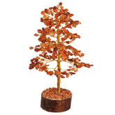 Fashionzaadi Carnelian crystal tree with gold wire for positive energy display.