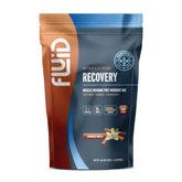 Fluid Recovery Cinnamon Vanilla bottle showcases a vegan post-workout option with balanced ingredients.