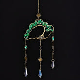 Fmelut Crystal Cloud Suncatcher on a sunny window creating sparkling light