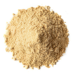 Food to Live Triphala Powder spoon ready for measuring into recipes.