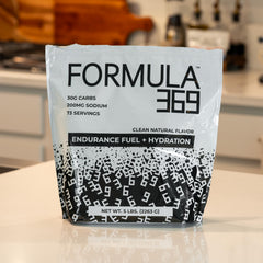 Formula 369 mixed in water illustrating easy hydration and clean flavor absence.