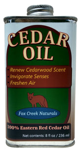 Fox Creek Cedar Oil bottle close-up with pure cedar aroma.