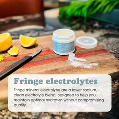 Fringe Electrolyte and Mineral Mix scoop ready for precise dosing.