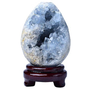FZBHRO Celestite geode egg with stand on display for a calm, inviting space.