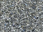 GAF TREASURES Labradorite Black chips close-up with iridescent sheen for jewelry and crafts.