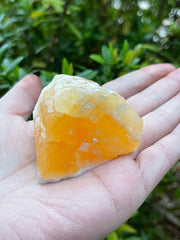GAF TREASURES orange calcite rough with natural veins and color variations for visual inspiration.