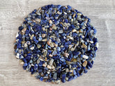 Gaf Treasures sodalite chips close-up showing natural blue hues for crafts.