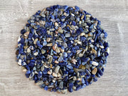 Gaf Treasures sodalite chips close-up showing natural blue hues for crafts.