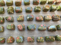 GAF TREASURES unakite polished rocks arranged for pocket carry and daily use