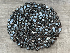 GAF TREASURES hematite large chips closeup highlighting smooth edges for jewelry projects.