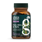 Gaia Herbs Hair, Skin & Nail bottle shows a plant-powered beauty ritual.