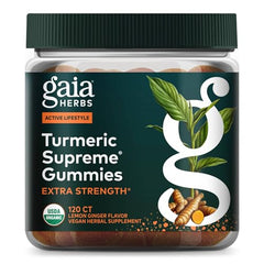 Gaia Herbs Turmeric Supreme Gummies bottle in a wellness setup for daily use