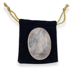 GEMSCITE carved palm stone detail supports chakra balancing during Reiki sessions.